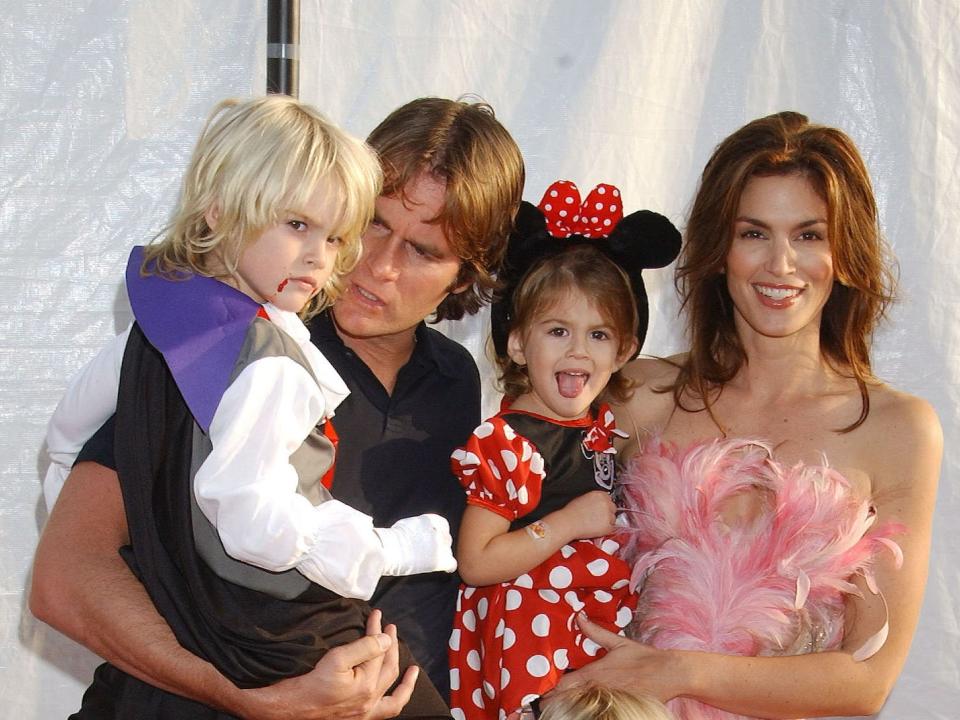 From left: Presley, Rande, and Kaia Gerber and Cindy Crawford in 2003.