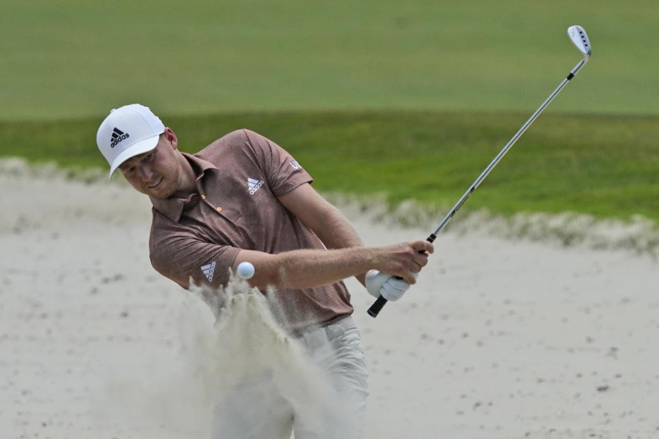 Daniel Berger hits out of the sand on the sixth hole during a practice round at the PGA Championship golf tournament on the Ocean Course Wednesday, May 19, 2021, in Kiawah Island, S.C. (AP Photo/Matt York)