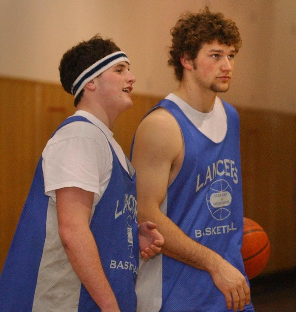 Luke Homan (left) and Joe Thomas practice with the varsity basketball team at Brookfield Central High School on Jan. 30, 2003. Both were key contributors to the Central football and basketball state qualifiers; Homan went on to play basketball at UW-Milwaukee and La Crosse.