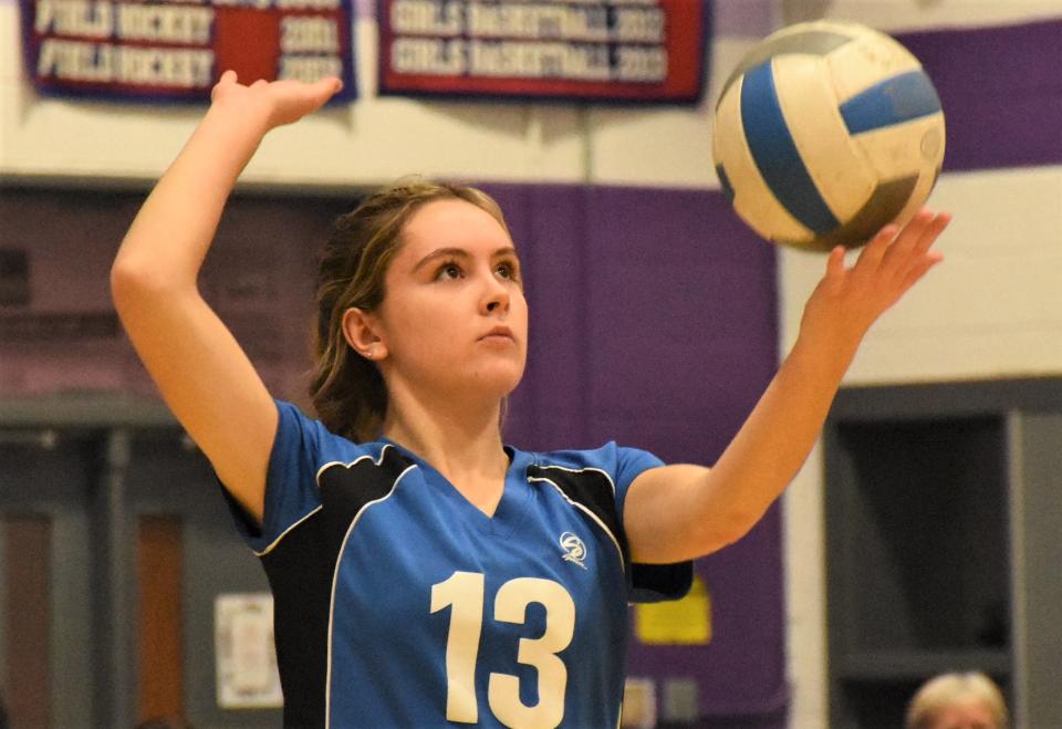 Dolgeville senior Reece Lamphere watches her toss for a serve against Little Falls Wednesday. Lamphere led the Blue Devils with 13 assists and matched team highs with 11 kills and eight aces in a come-from-behind 3-2 victory.