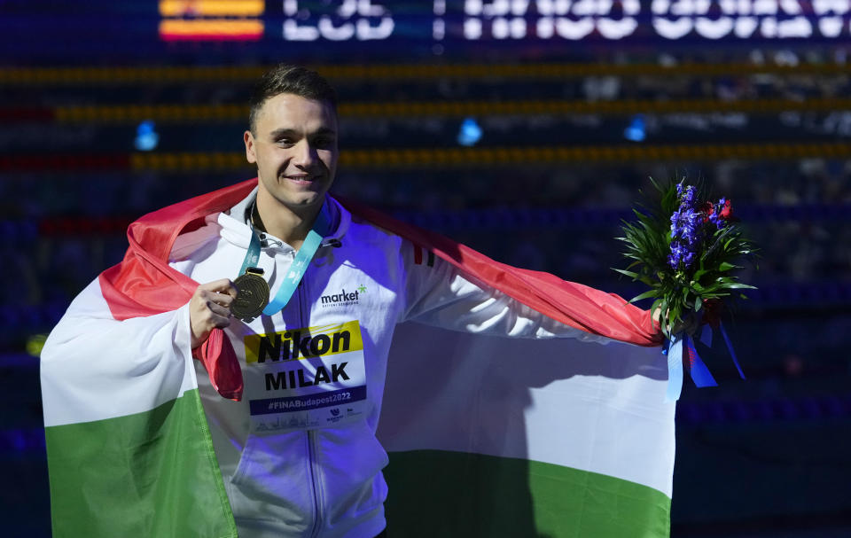 Kristof Milak of Hungary celebrate after winning the Men 200m Butterfly final at the 19th FINA World Championships in Budapest, Hungary, Tuesday, June 21, 2022. (AP Photo/Petr David Josek)