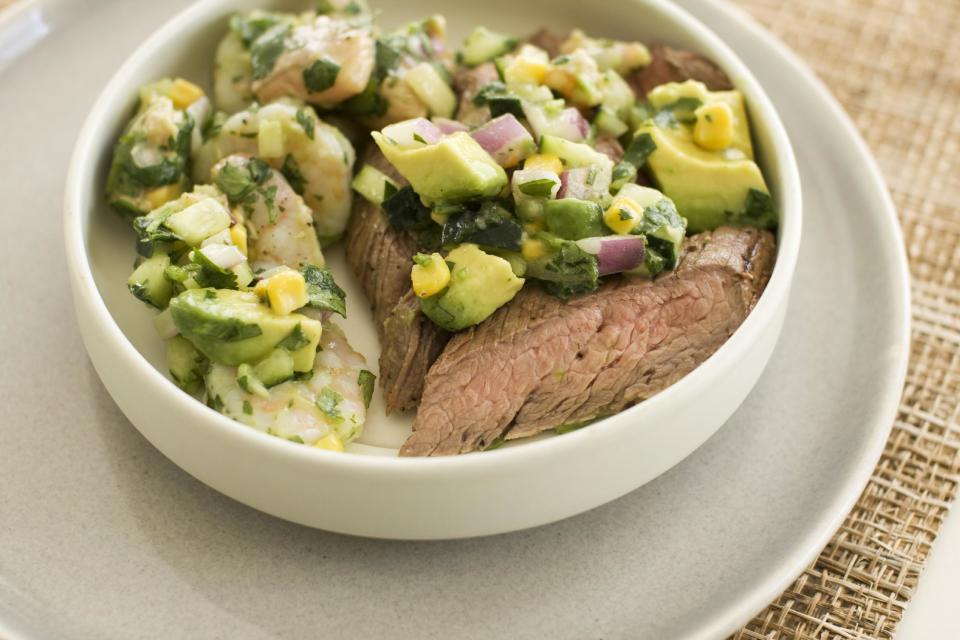 In this image taken on May 13, 2013, a recipe for pepper-lime flank steak with shrimp and salmon ceviche is displayed in Concord, N.H. (AP Photo/Matthew Mead)