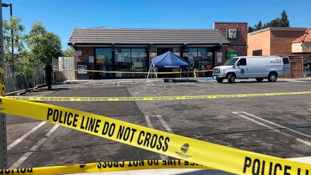 PHOTO: Police crime scene tape closes off a parking area following a shooting at a 7-Eleven store in Brea, Calif., July 11, 2022. (Eugene Garcia/AP)