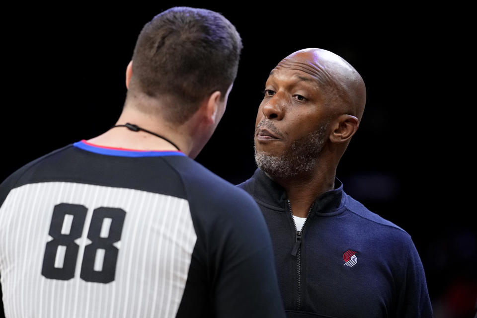 Portland Trail Blazers coach Chauncey Billups argues his technical foul with referee Matt Kallio (88) during the first half of the team's NBA basketball game against the Phoenix Suns, Friday, Nov. 4, 2022, in Phoenix. (AP Photo/Matt York)