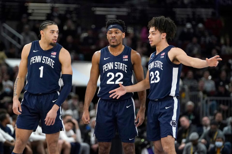 Penn State's Seth Lundy (1), Jalen Pickett, and Dallion Johnson (23) talk during a break in the action in the first half against Purdue this season. Pickett and Lundy were taken in the NBA Draft Thursday night.