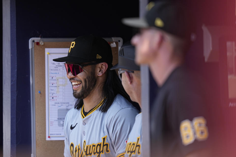 Pittsburgh Pirates first base Connor Joe (2) laughs in the dugout during a baseball game against the Atlanta Braves, Sunday, June 30, 2024, in Atlanta. (AP Photo/Brynn Anderson)
