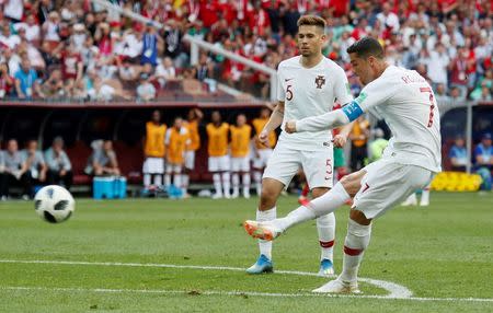 Soccer Football - World Cup - Group B - Portugal vs Morocco - Luzhniki Stadium, Moscow, Russia - June 20, 2018 Portugal's Cristiano Ronaldo shoots at goal from a free kick REUTERS/Maxim Shemetov