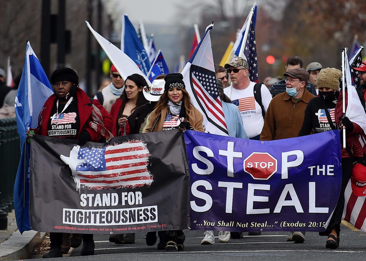 Supporters of US President Donald Trump participate in the Million MAGA March  to protest the outcome of the 2020 presidential election on December 12, 2020 in Washington, DC.