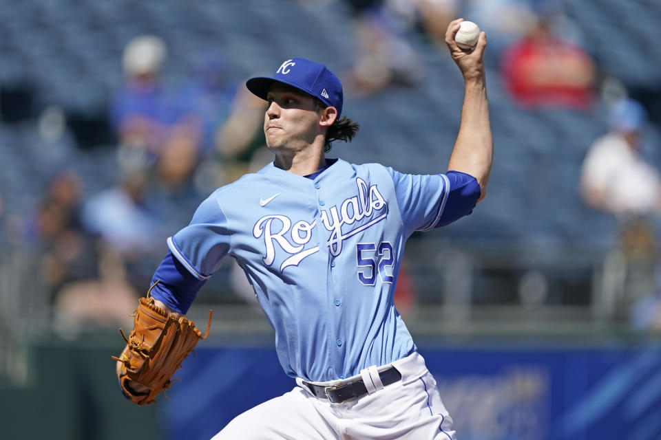 Kansas City Royals starting pitcher Daniel Lynch throws during the first inning of a baseball game against the Oakland Athletics Thursday, Sept. 16, 2021, in Kansas City, Mo. (AP Photo/Charlie Riedel)