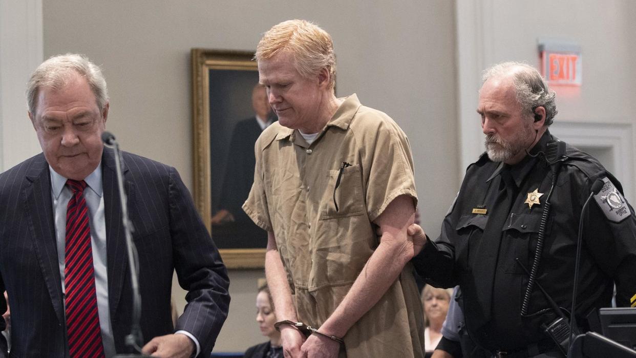 alex murdaugh is led out of a courthouse in handcuffs at his sentencing hearing on march 3