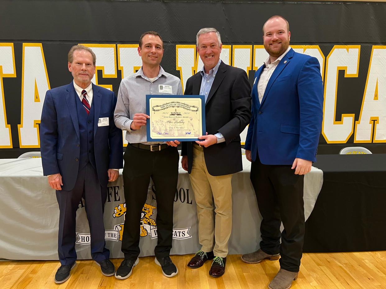 Maury County Administrator of Elections Chris Mackinlay Santa Fe Unit School, second from left, is presented a certificate for Santa Fe Unit School's Gold Level Anne Dallas Dudley Award, which is given to schools who attain 100% voter registration for all eligible students.