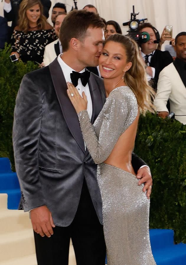 The pair put on a PDA-filled show for waiting photographers. Photo: Getty