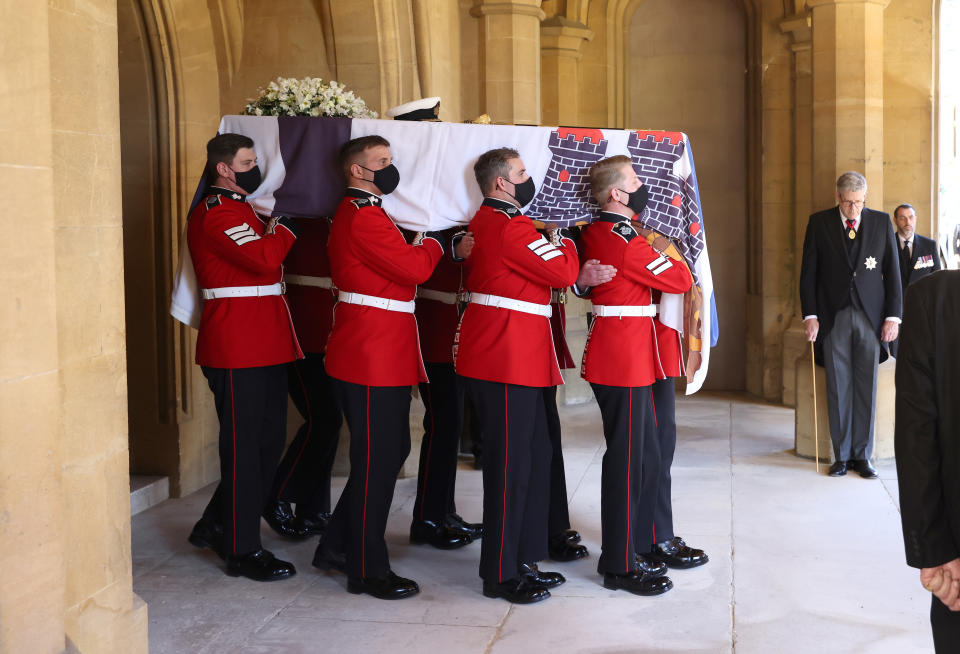 The Duke of Edinburgh&#39;s coffin, covered with his Personal Standard, is carried ahead of the funeral of the Duke of Edinburgh at Windsor Castle, Berkshire. Picture date: Saturday April 17, 2021.