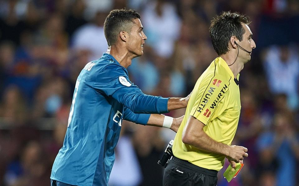 Cristiano Ronaldo pushed the referee after he was sent off against Barcelona - Getty Images Europe