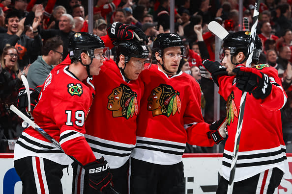 CHICAGO, IL - NOVEMBER 13: (L-R) Jonathan Toews #19, Marian Hossa #81, Richard Panik #14 and Nick Schmaltz #8 of the Chicago Blackhawks celebrate after Hossa scored against the Montreal Canadiens in the second period at the United Center on November 13, 2016 in Chicago, Illinois. (Photo by Chase Agnello-Dean/NHLI via Getty Images)