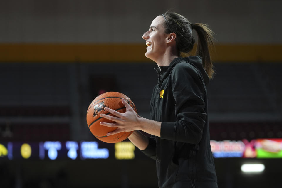 Iowa guard Caitlin Clark warms up before an NCAA college basketball game against Minnesota, Wednesday, Feb. 28, 2024, in Minneapolis. (AP Photo/Abbie Parr)