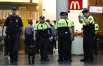 Police work the crime scene at Union Station in Washington, DC, after responding to a shooting inside the station on September 11, 2015