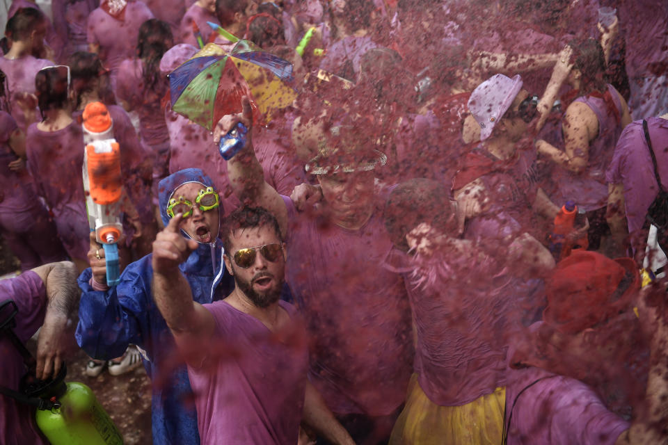 <p>People take part in a wine battle, in the small village of Haro, northern Spain, Friday, June 29, 2018. (Photo: Alvaro Barrientos/AP) </p>