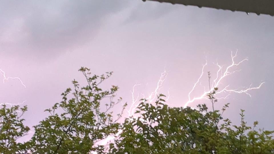 Lightning shoots over Redding during an evening thunderstorm on Monday, June 5, 2023.