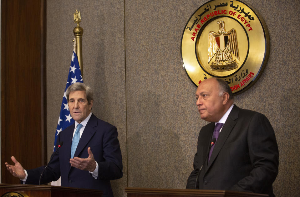 U.S. climate envoy John Kerry, left, speaks during a press conference with Egyptian Foreign Minister Sameh Shoukry, at the foreign ministry headquarters in Cairo, Egypt, Monday, Feb. 21, 2022. (AP Photo/Amr Nabil)