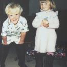 Candice Swanepoel's cheeky smile is evident in this photo she posted of herself and her younger brother when they were kids.
