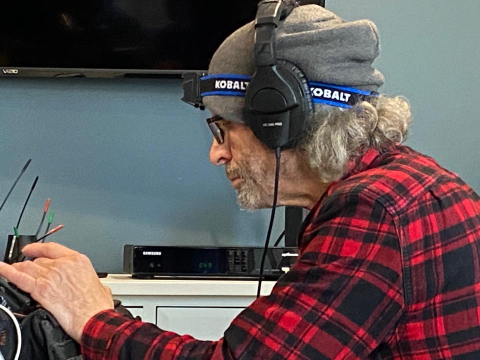 Recording technician Joe Cantor checking sound levels during the recording of "Mob Stories."