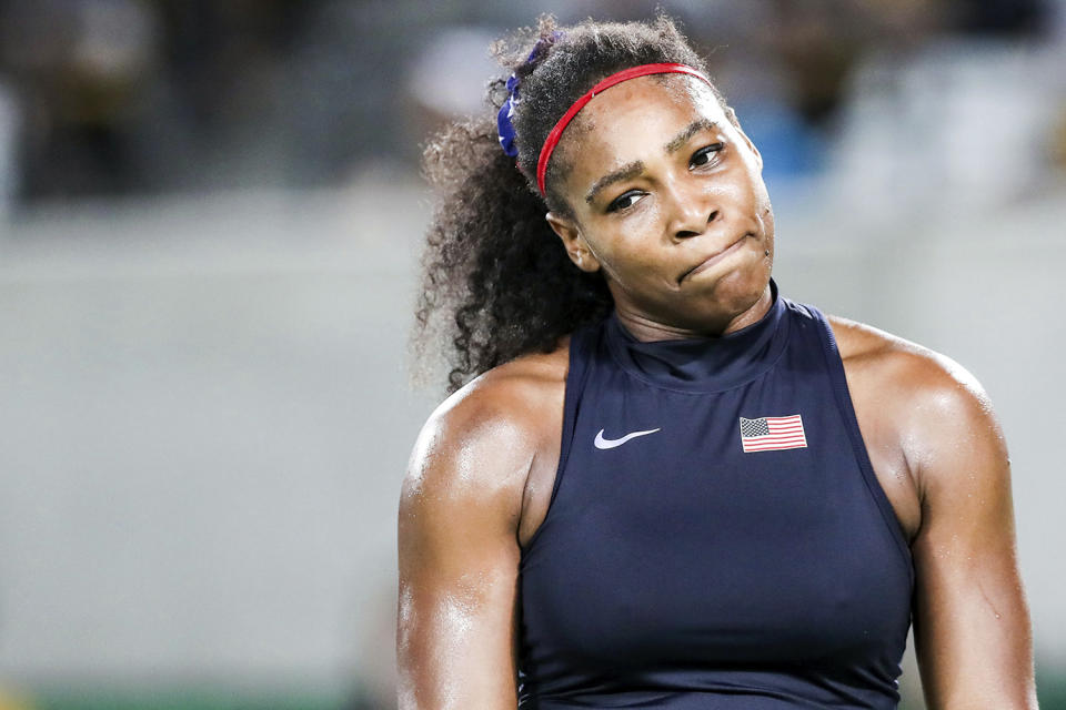 <p>Serena Williams of the United States reacts after losing against Elina Svitolina of Ukraine in a Women’s Singles Third Round match on Day 4 of the Rio 2016 Olympic Games at the Olympic Tennis Centre on August 9, 2016 in Rio de Janeiro, Brazil. (Photo by William Volcov/Brazil Photo Press/LatinContent/Getty Images) </p>