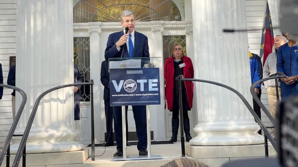 PHOTO: North Carolina Gov. Roy Cooper speaks at the state's party rally to kick off in-person early voting (ABC News)