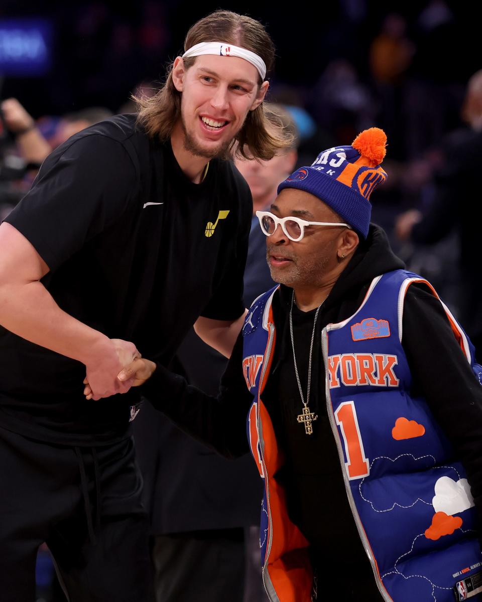 Jan 30, 2024; New York, New York, USA; Utah Jazz forward Kelly Olynyk (41) shakes hands with New York Knicks fan Spike Lee before a game at Madison Square Garden. Mandatory Credit: Brad Penner-USA TODAY Sports