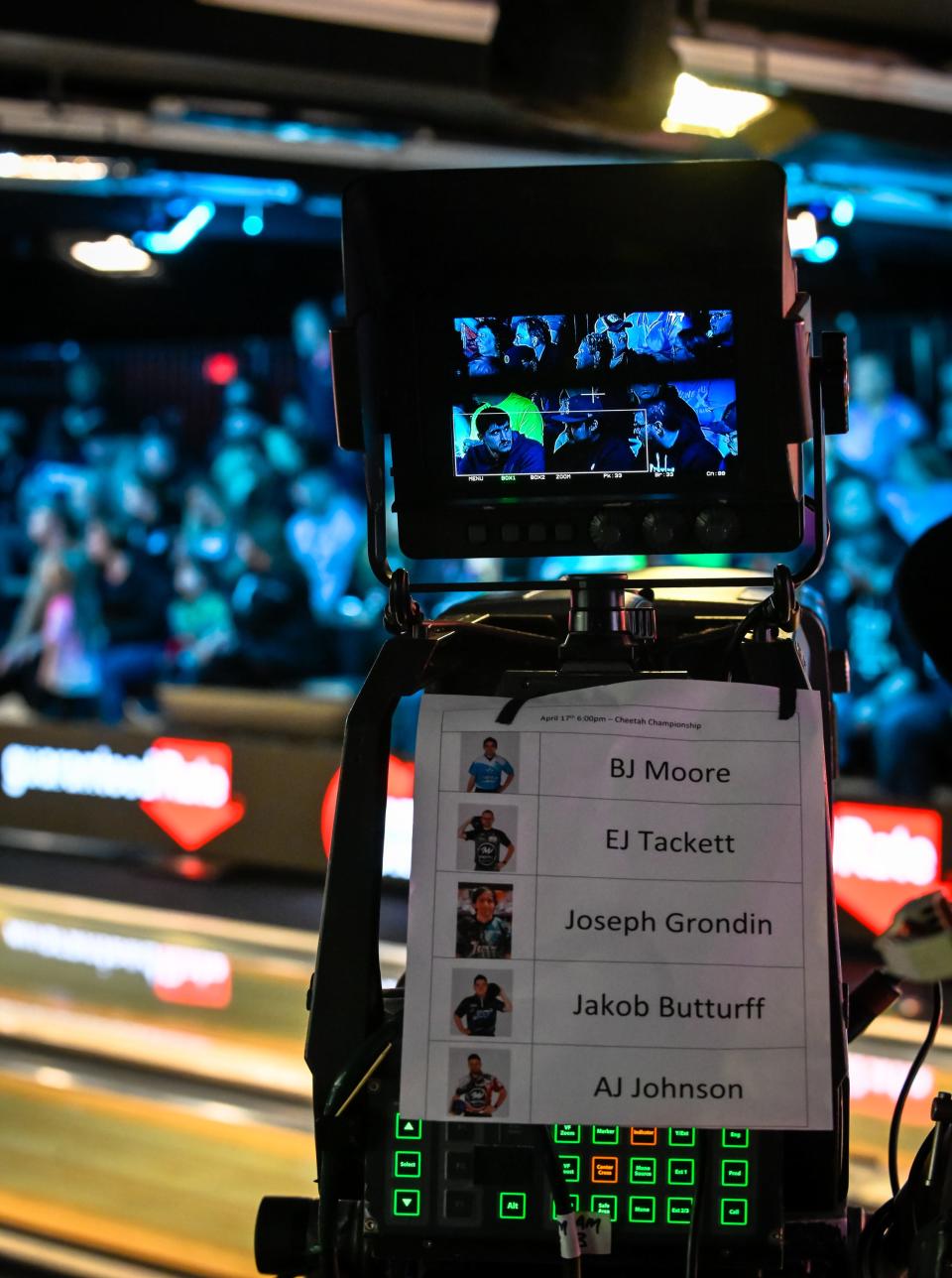 A Fox Sports television camera focuses on the crowd between matches during the Cheetah Championship finals Monday night.