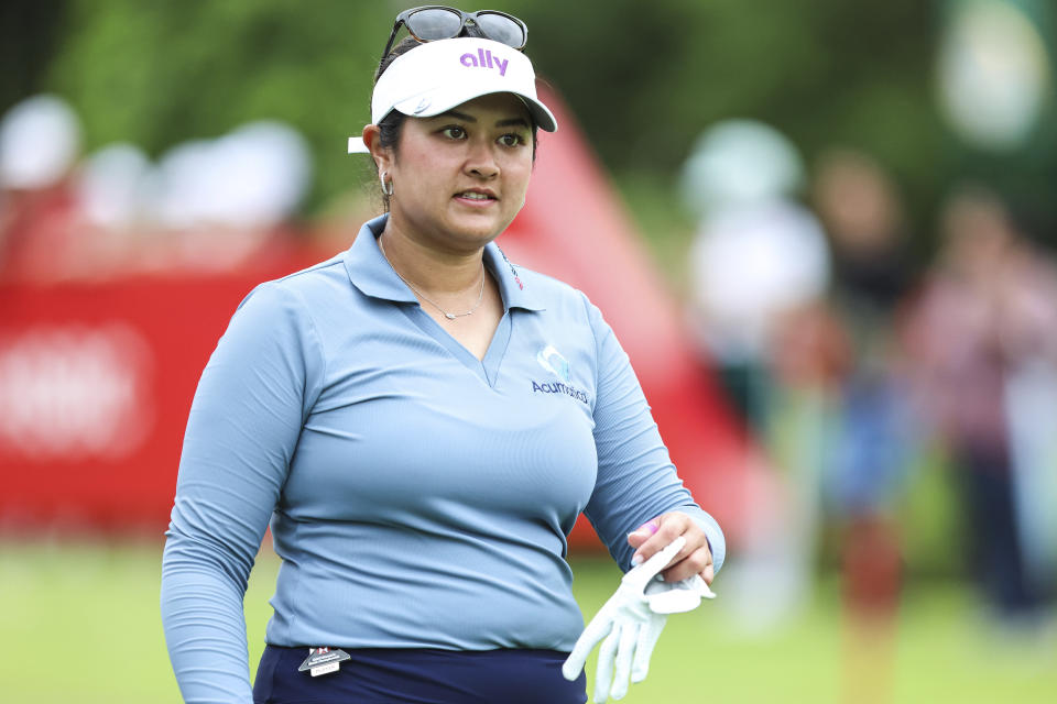 Lilia Vu of the U.S., reacts after playing her shot on the first tee during the final round of the HSBC Women's Wold Championship at the Sentosa Golf Club in Singapore Sunday, March 3, 2024. (AP Photo/Danial Hakim