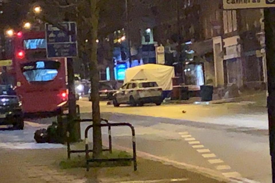 Hit-and-run: A forensics tent at the scene of the fatal crash in Brixton