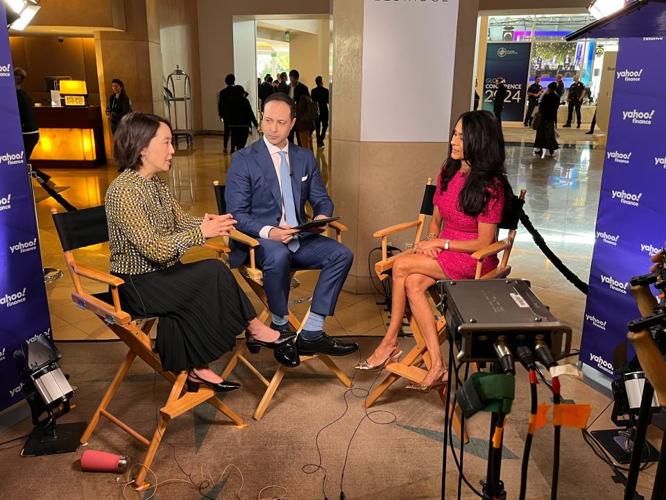 Nuveen CIO Sara Mailk says put that money to work! Mailik (right) talks with Yahoo Finance executive editor Brian Sozzi and anchor Akiko Fujita at the Milken Institute Conference.