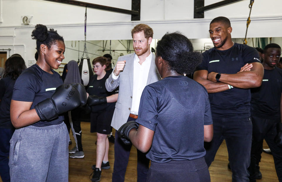 The Duke of Sussex stands with boxer Anthony Joshua as he watches young boxers at the launch of Made by Sport, a new campaign bringing together a coalition of charities supporting disadvantaged young people through sport, at the Black Prince Trust in Lambeth.