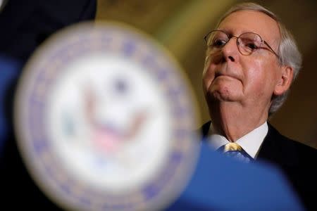 FILE PHOTO: Senate Majority Leader Mitch McConnell speaks to the media about plans to repeal and replace Obamacare on Capitol Hill in Washington, U.S., June 27, 2017. REUTERS/Aaron P. Bernstein/File Photo