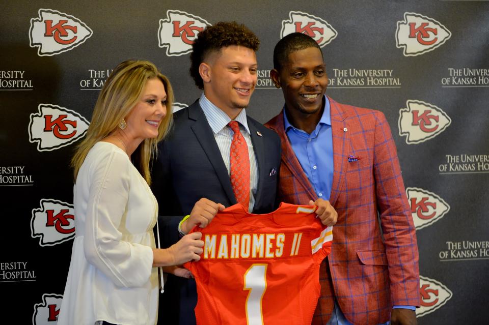 Patrick Mahomes poses for a photo with his mother, Randi, and father, Pat, during the press conference at Stram Theatre when he was selected in the NFL draft by the Kansas City Chiefs.