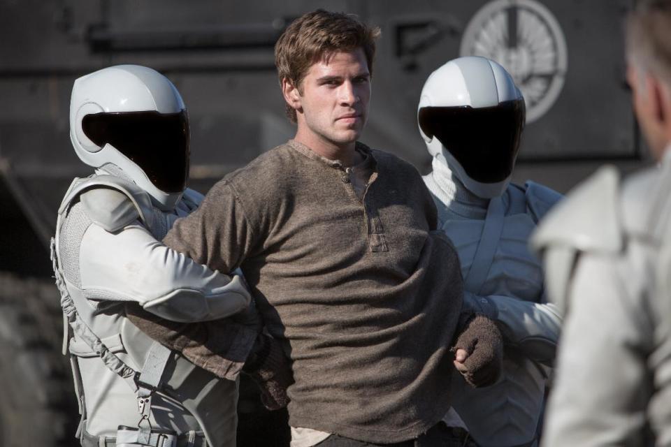 This image released by Lionsgate shows Liam Hemsworth as Gale Hawthorne in a scene from "The Hunger Games: Catching Fire." (AP Photo/Lionsgate, Murray Close)