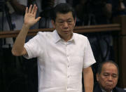 Chinese-born Filipino businessman Kam Sin Wong takes an oath during the money laundering hearing at Senate in Manila March 29, 2016. REUTERS/Romeo Ranoco