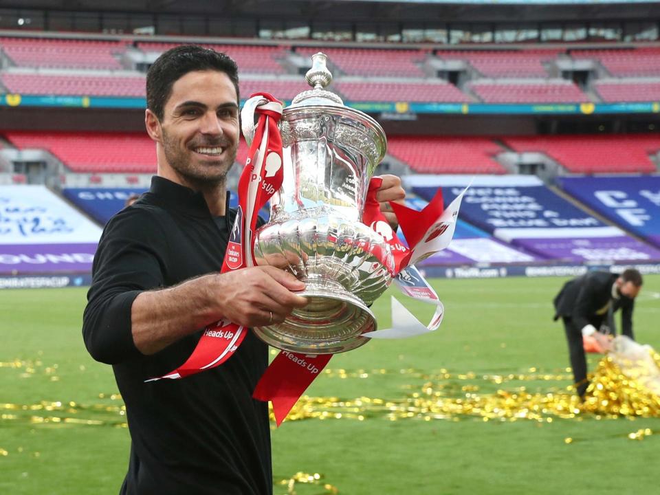 Mikel Arteta celebrates Arsenal's FA Cup win that has secured them a place in the Europa League: AP