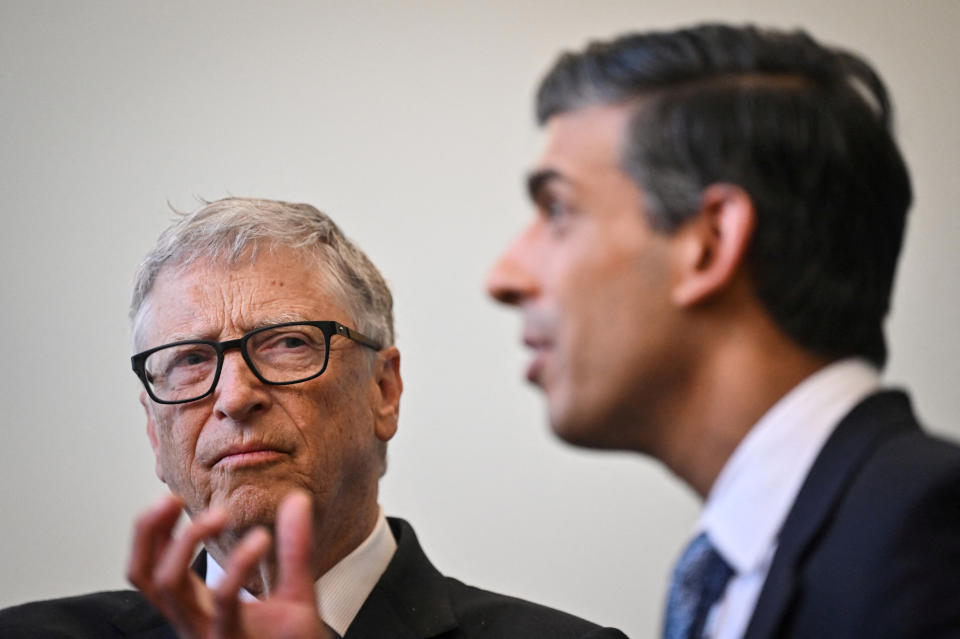 Britain's Prime Minister Rishi Sunak and  Microsoft founder Bill Gates react as they speak during a visit of the Imperial College University,, in London, Britain, February 15, 2023. Justin Tallis//Pool via REUTERS