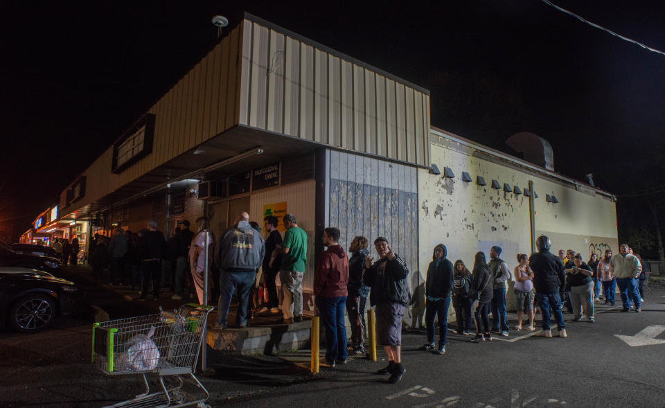 Customers wait patiently outside Positively Records in Levittown before it opened at midnight in celebration of Record Store Day  in Levittown.