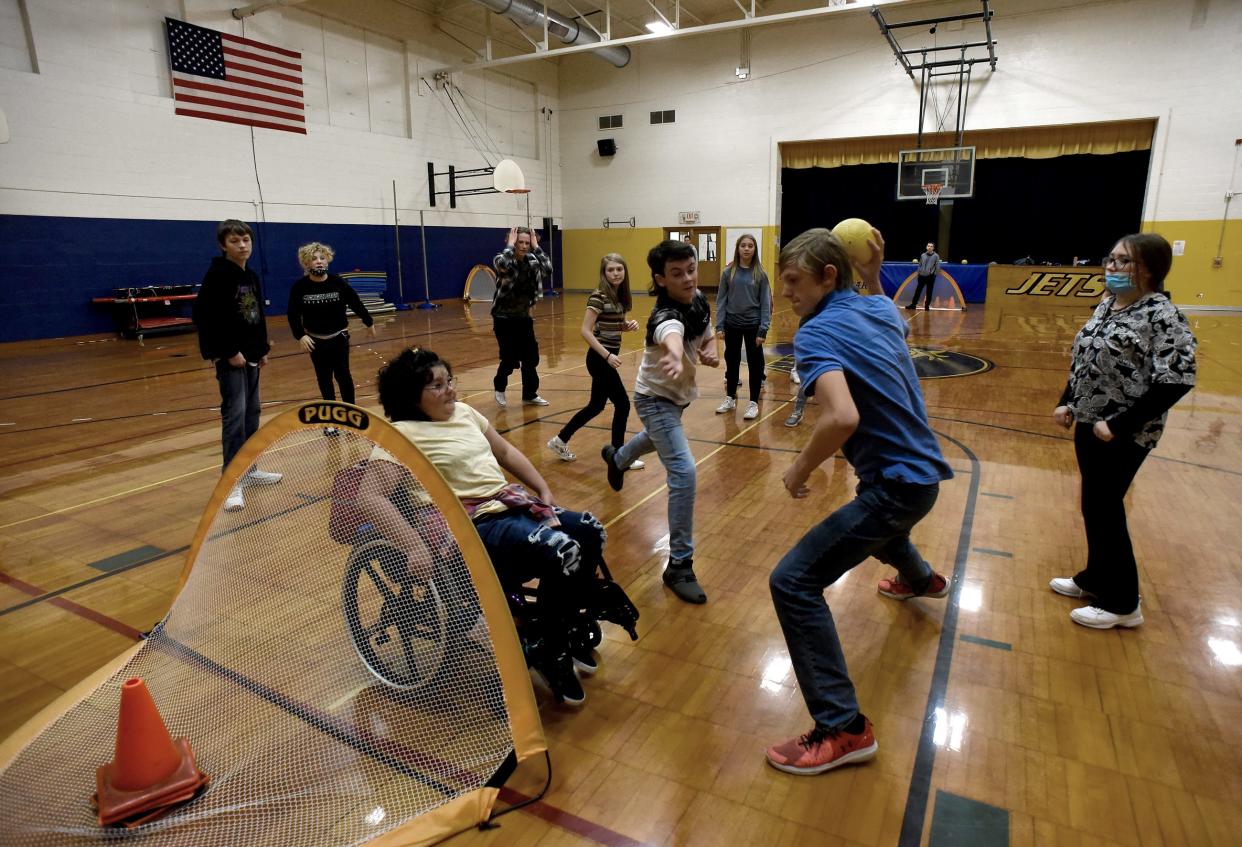 Elly Wickenheiser, 13 , of Carleton playes goalie in a game of hand ball with her eighth grade classmates at Wagar Middle School.