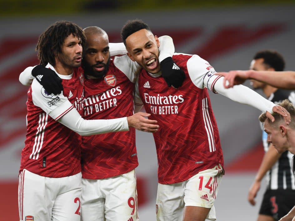 Pierre-Emerick Aubameyang celebrates scoringArsenal FC via Getty Images