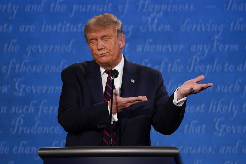 President Donald Trump gestures while speaking during the first presidential debate Tuesday, Sept. 29, 2020, at Case Western University and Cleveland Clinic, in Cleveland, Ohio. (AP Photo/Julio Cortez)