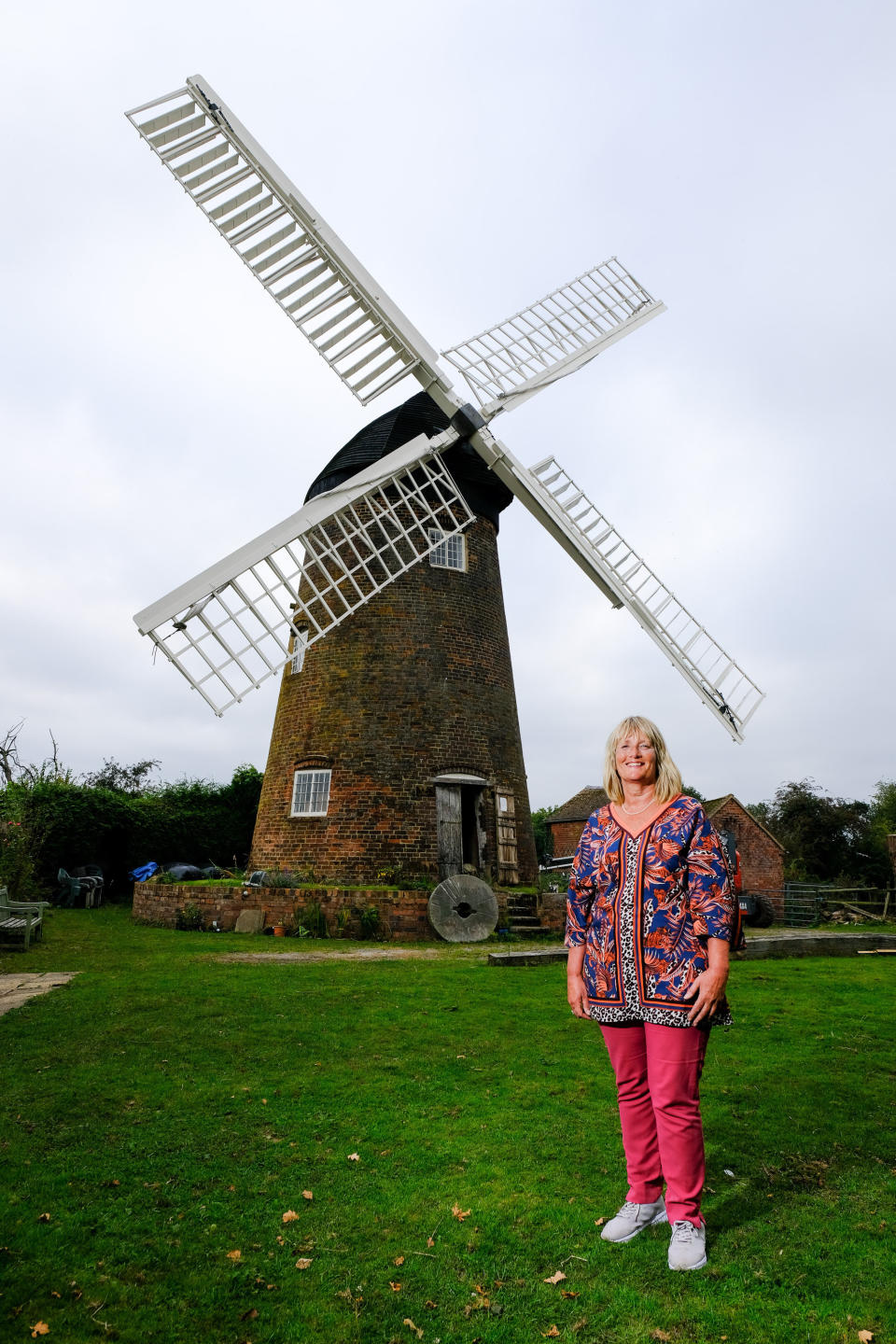 A homeowner has completed the ultimate lockdown DIY project at one of Britain's last fully-working windmills - after using a cherry picker to paint the sails by hand. Jeanette McGarry, 58, painstakingly spent three weeks touching up the paintwork on the gigantic five tonne sails as part of a refurbishment of historic Berkswell Windmill. The 70ft tall Grade II-listed building has been standing for nearly 200 years in the village of Balsall Common, West Mids., and was bought by Jeannette in 2005. She then spent £200,000 restoring the 19th century four-bladed tower mill to its former glory with the help of English Heritage after it fell into a state of disrepair.