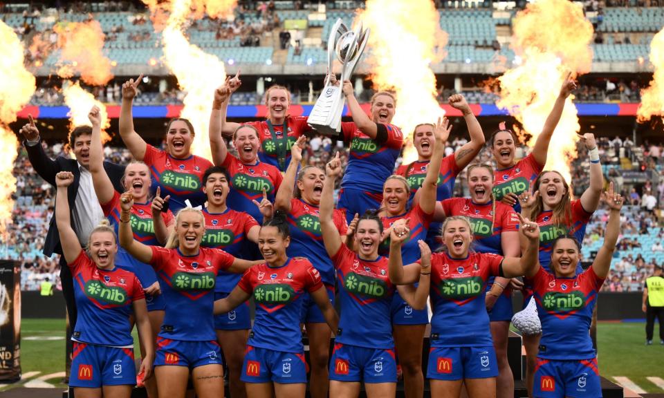 <span>Knights players celebrate winning the 2023 NRLW grand final. Two teams will join the competition next year thanks to growth in its popularity.</span><span>Photograph: James Gourley/AAP</span>