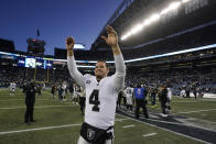 Las Vegas Raiders quarterback Derek Carr celebrates after an overtime win over the Seattle Seahawks during an NFL football game Sunday, Nov. 27, 2022, in Seattle. (AP Photo/Gregory Bull)
