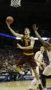 Arizona State center Jordan Bachynski (13) drives to the basket during the first half of a second round NCAA college basketball tournament game against the Texas Thursday, March 20, 2014, in Milwaukee. (AP Photo/Morry Gash)