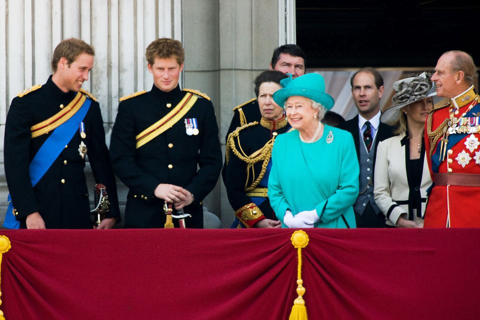 The Queen laughs with Princes William and Harry at Trooping the Colour celebrations in 2008.