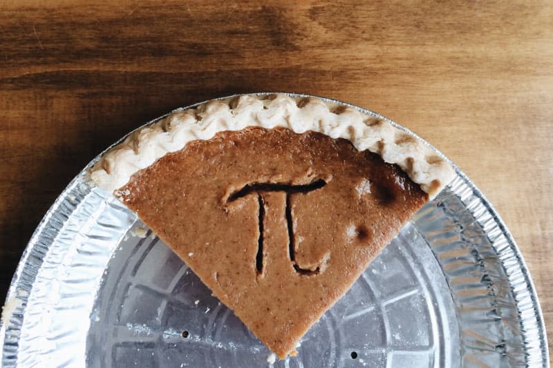 Part of a Pumpkin pie with pi symbol on it